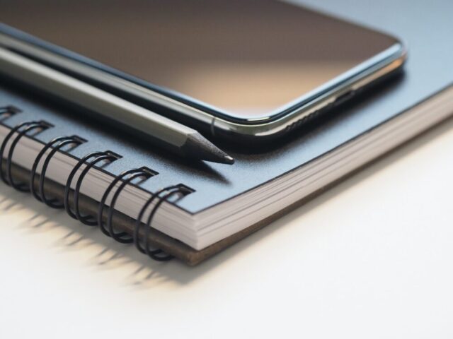 pen phone notebook