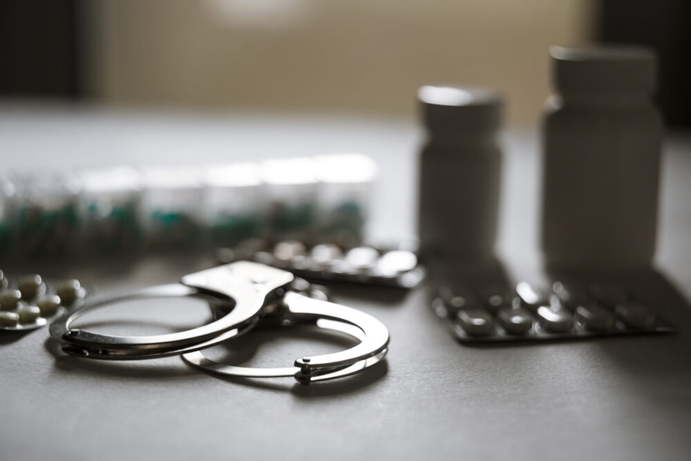 Handcuffs and pills