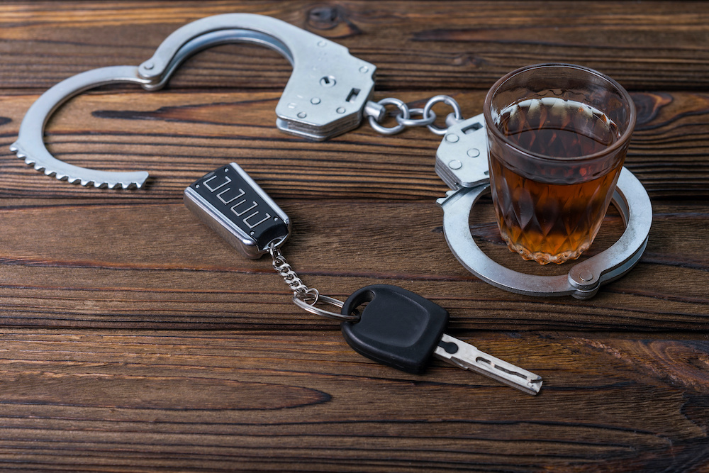alcohol handcuffs key