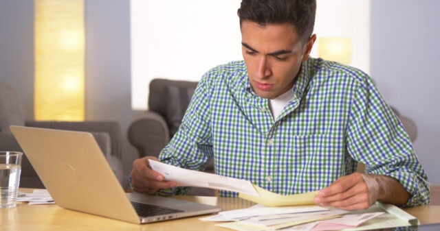 man reading letter