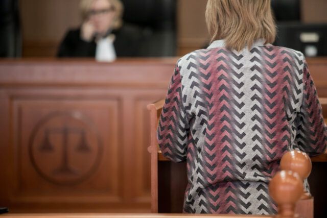 woman judge hearing