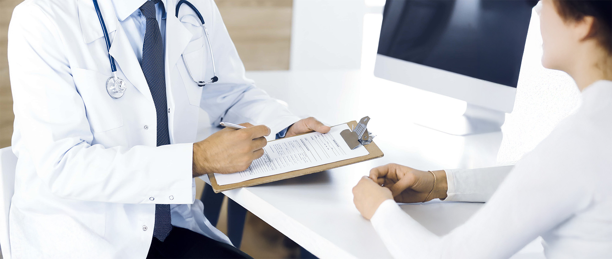 Doctor and patient discussing medical exam results