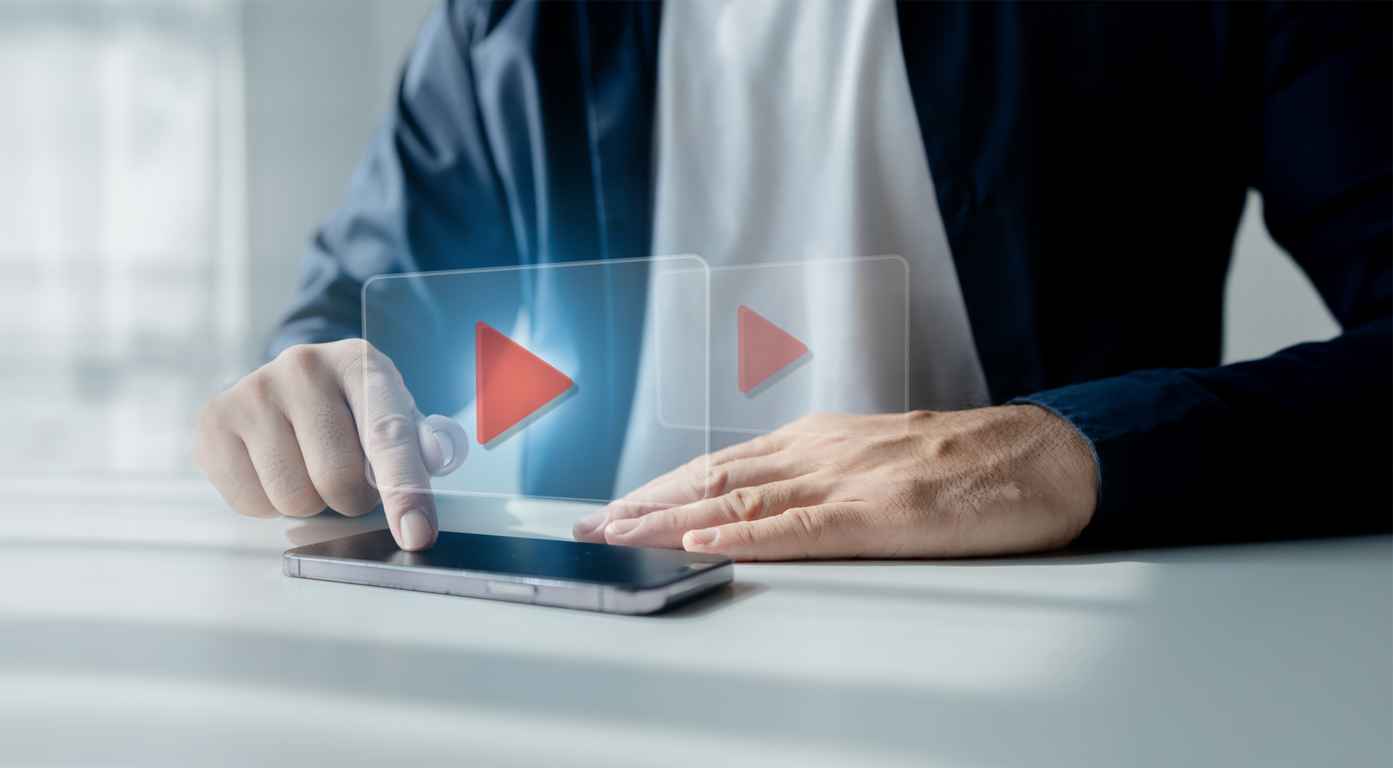 Person watching video clips on smartphones streaming videos