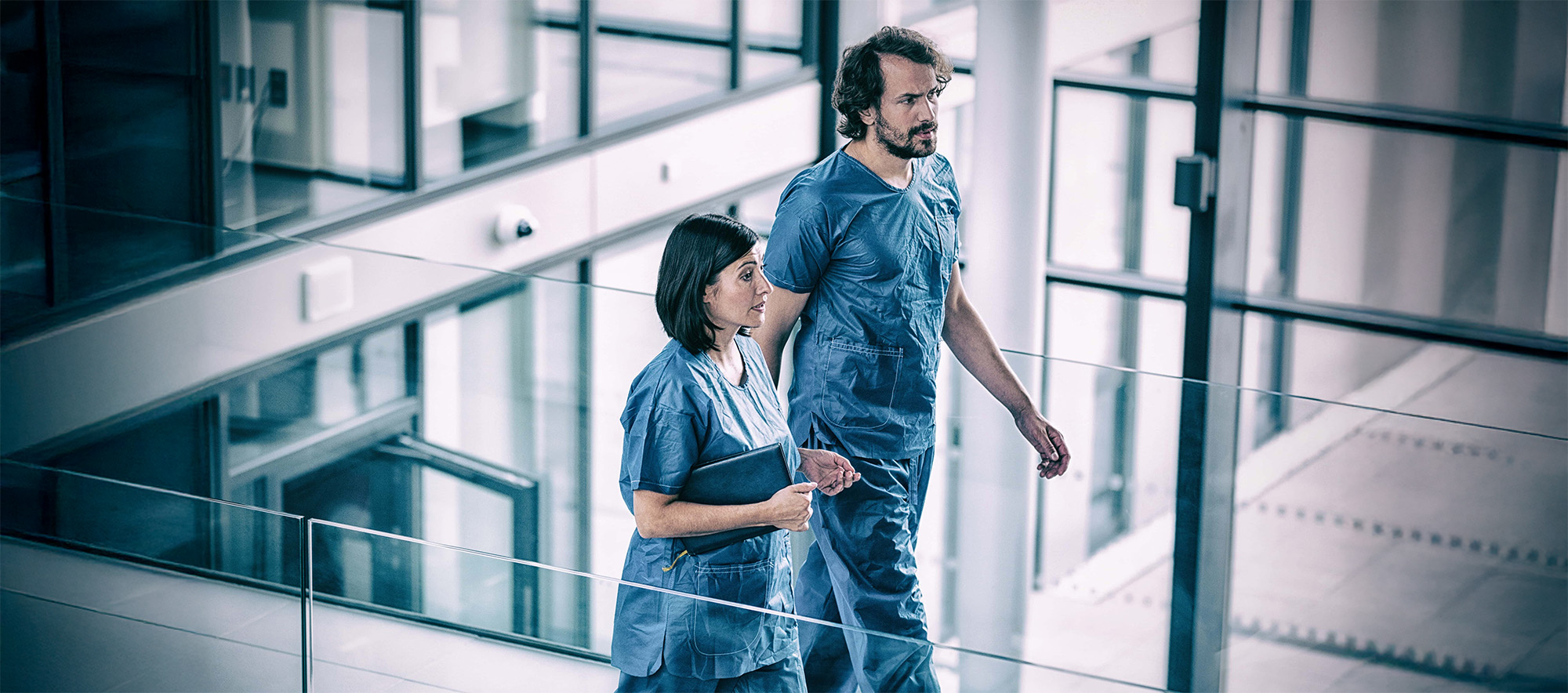 Surgeons walking in corridor