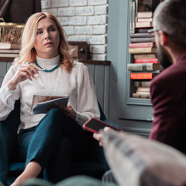 psychologist speaking with patient
